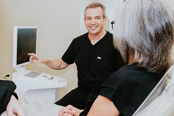 Photo of dentist performing general dental exam